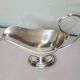 silver metal gravy boat