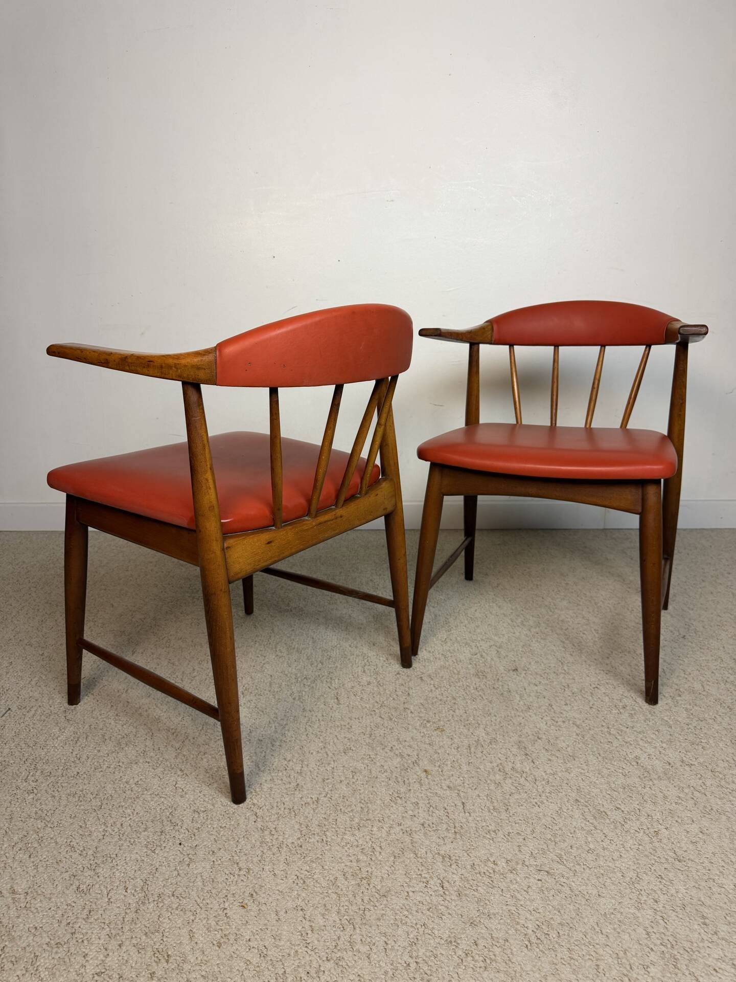 Pair of Scandinavian armchairs in teak and red faux leather – 1960s