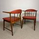 Pair of Scandinavian armchairs in teak and red faux leather – 1960s