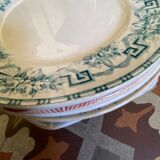 7 matching dessert plates in red green and blue.