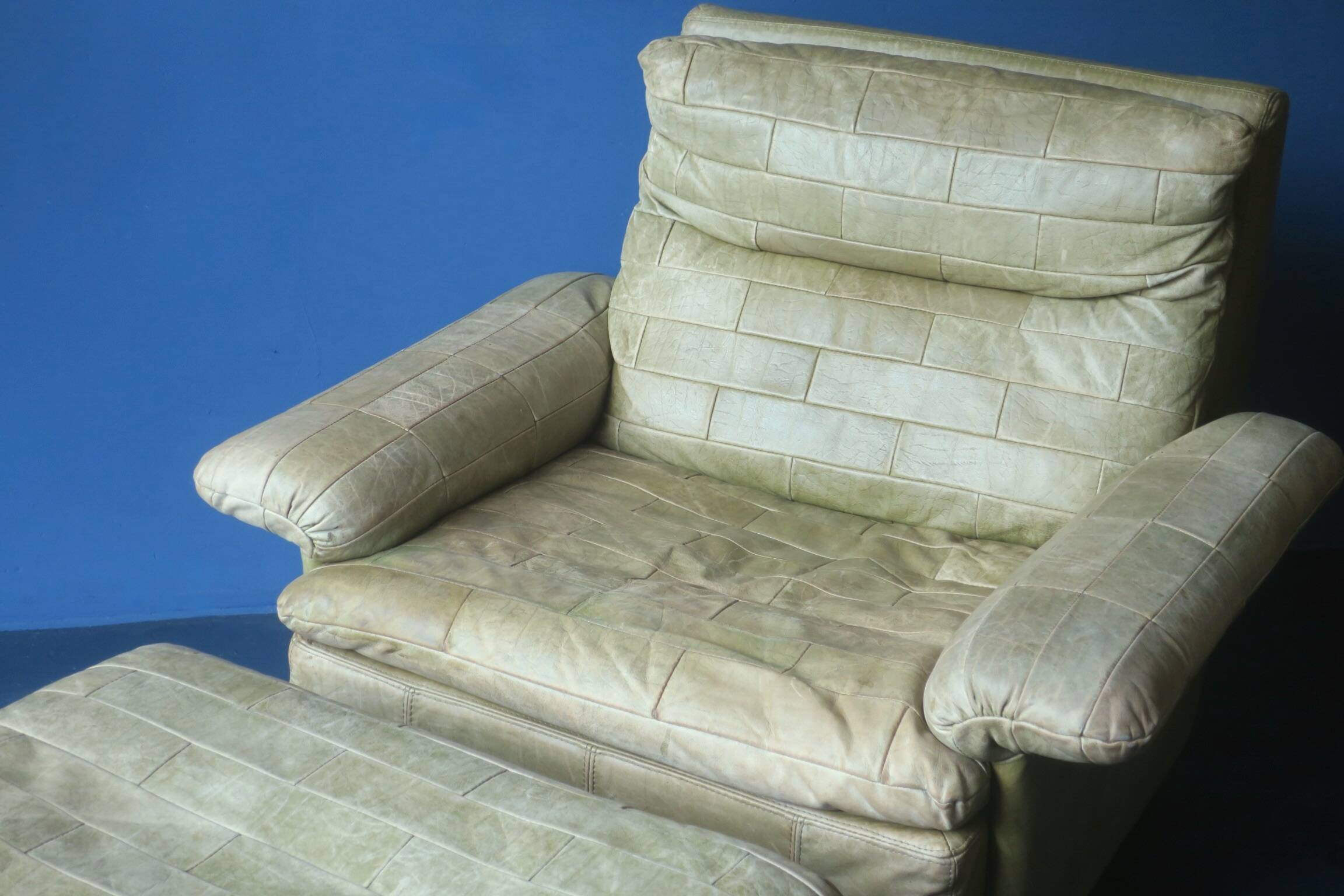 Patchwork leather olive green lounge chair and ottoman by Laauser, 1970s