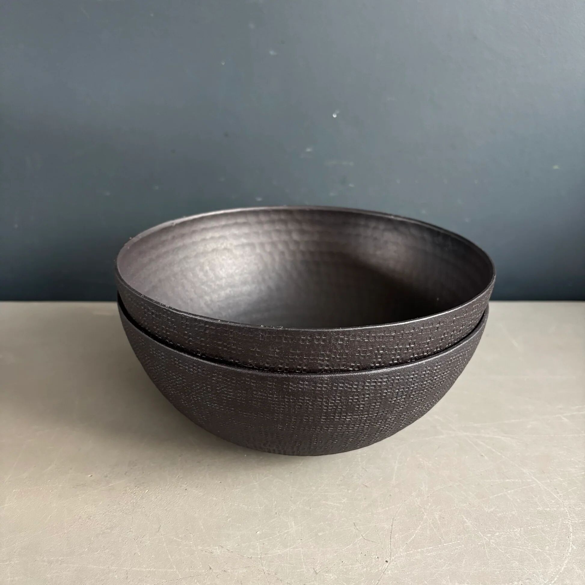 Pair of black lacquered metal catchall bowls