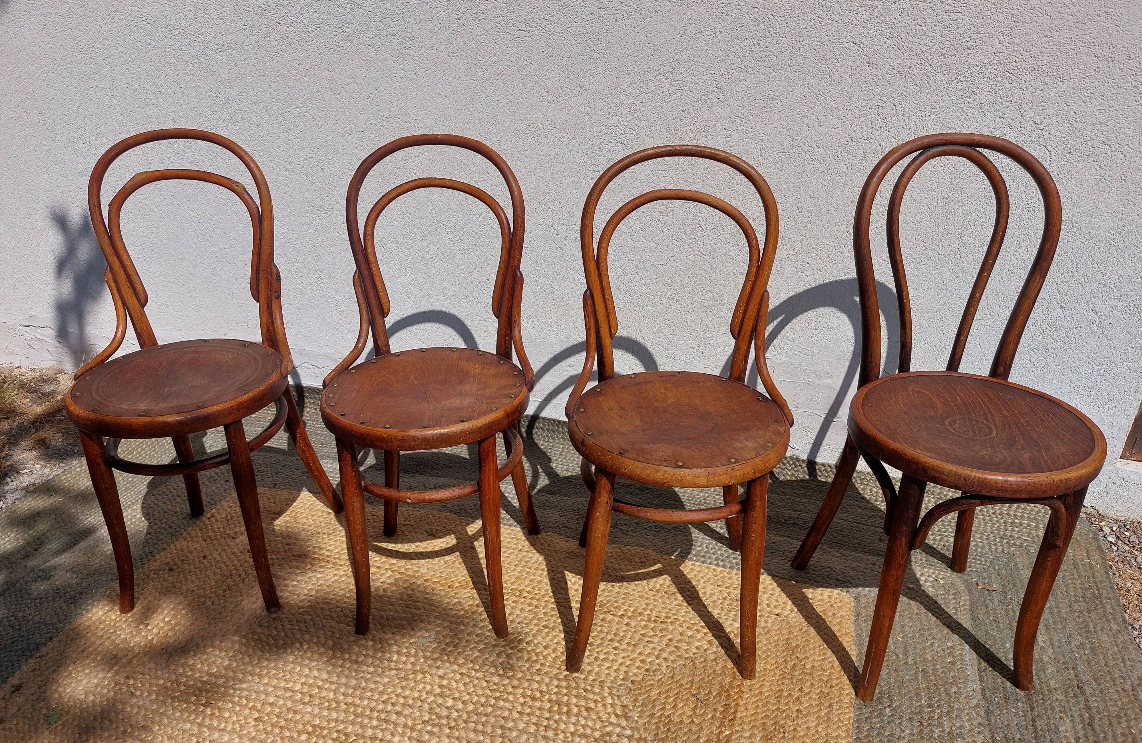 4 curved wooden bistro chairs
