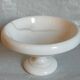 Standing cup in old white marble