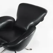 "Dodo" armchair in black leather. Design by Toshiyuki Kita. Cassina. Italy.