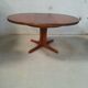 Table ronde extensible baumann en merisier