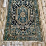 Tapis Persan ancien fond vert, noué main, certifié