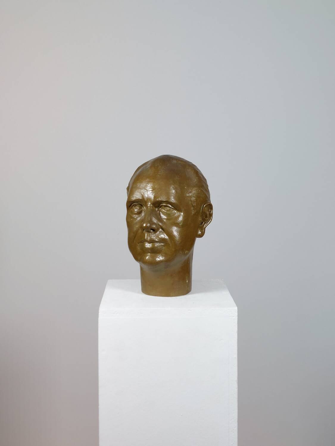 Vintage sculptural bust in bronzed plaster of a man.