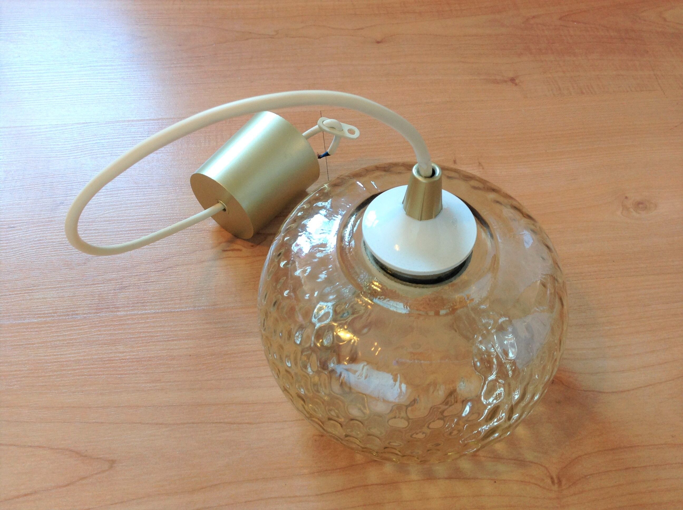 Globe pendant lamp in bubbled amber glass / vintage 60s-70s