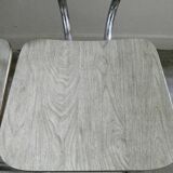 Paire de chaises en formica effet veines de bois et chant doré