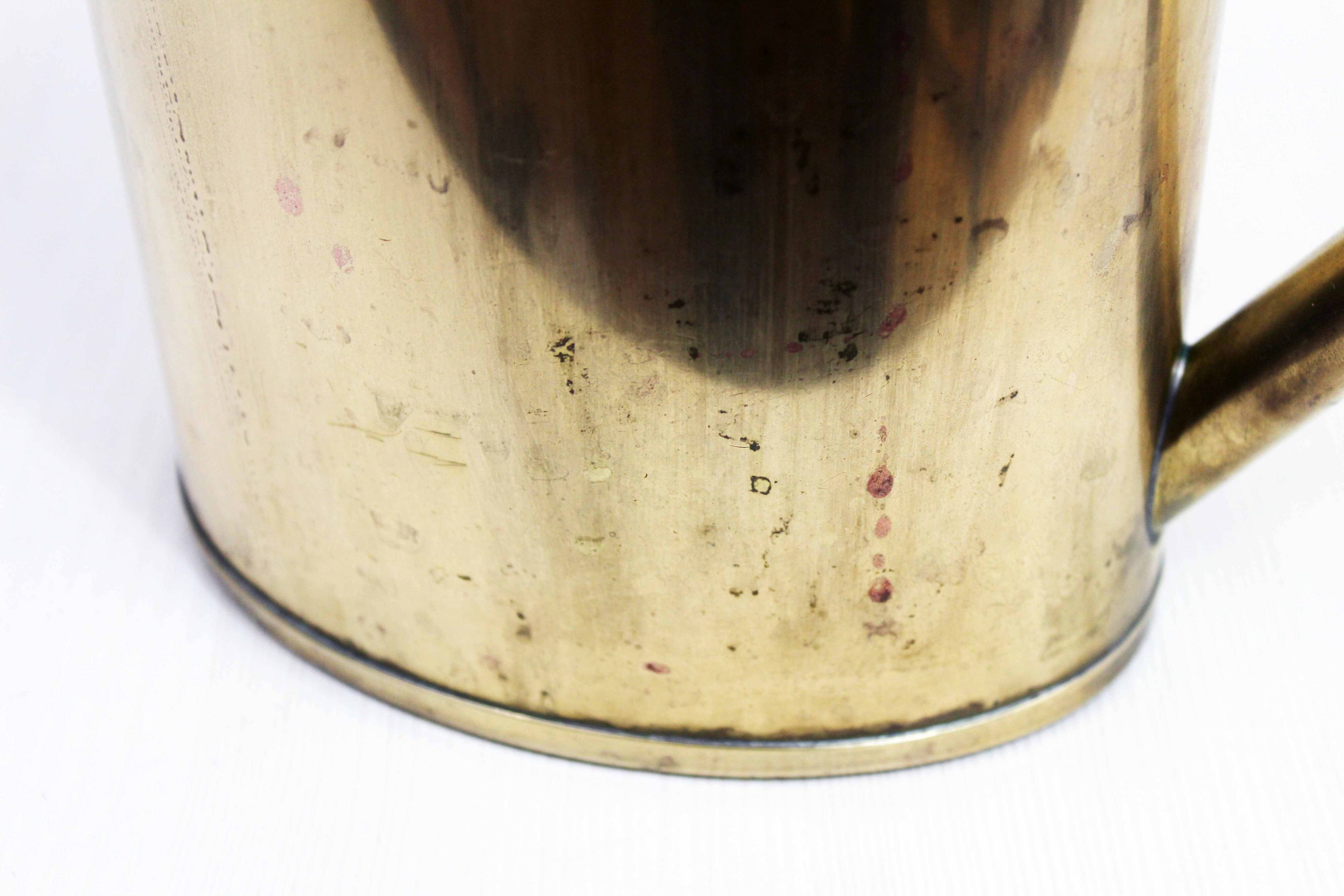 Vintage brass watering can