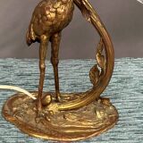 Gilded bronze lamp with the figure of a heron in Art Nouveau style.