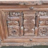 Old wooden console with chains
