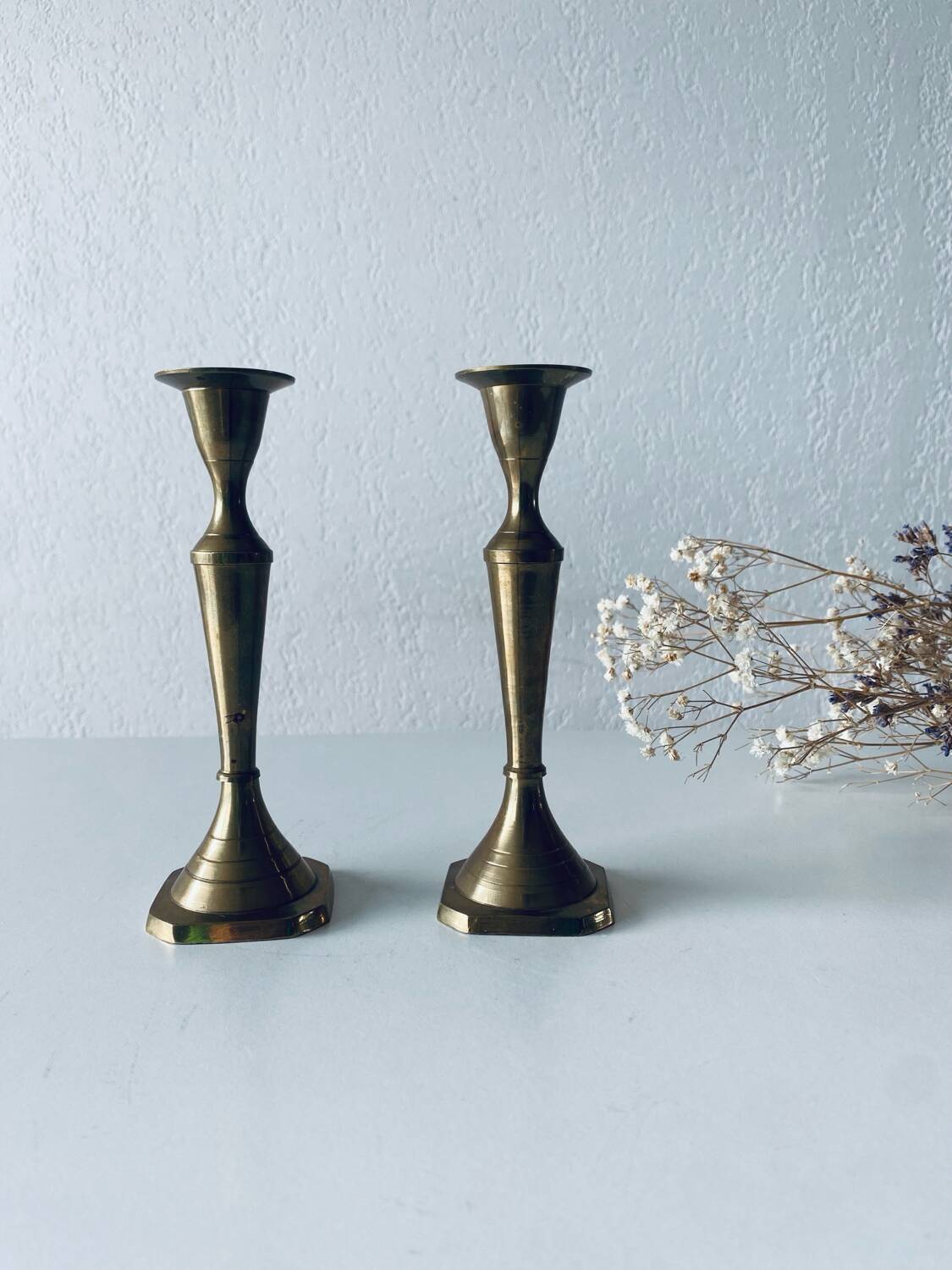 Pair of Indian brass candlesticks