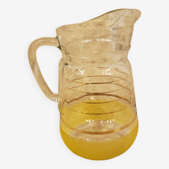 Yellow granite glass jug with gold edging