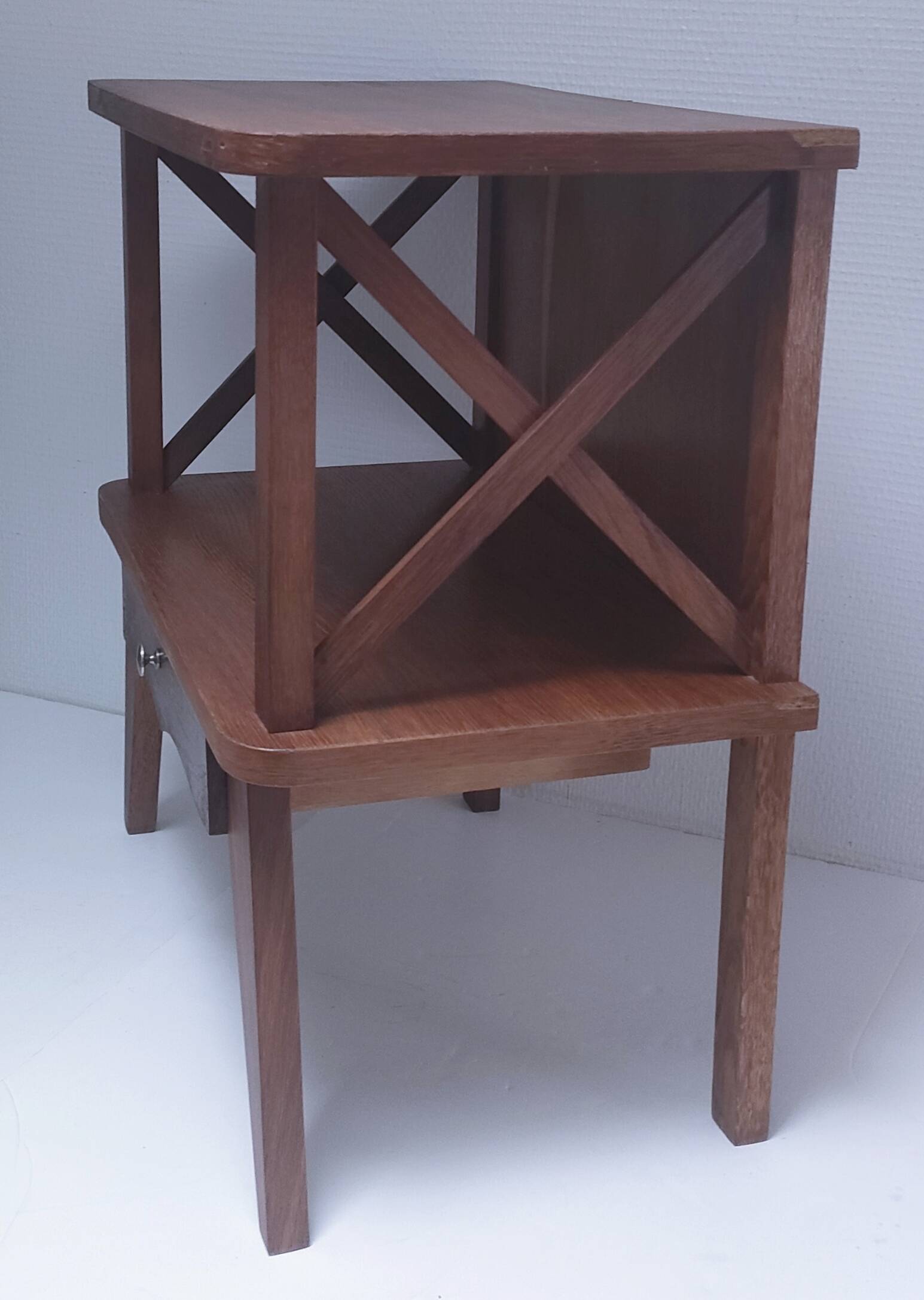 vintage wooden bedside table with crossbars and tapered legs