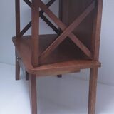 vintage wooden bedside table with crossbars and tapered legs