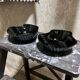 2 black shell cups