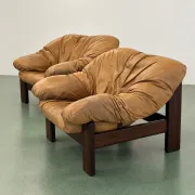 Pair of brutalist leather lounge chairs, 1960s