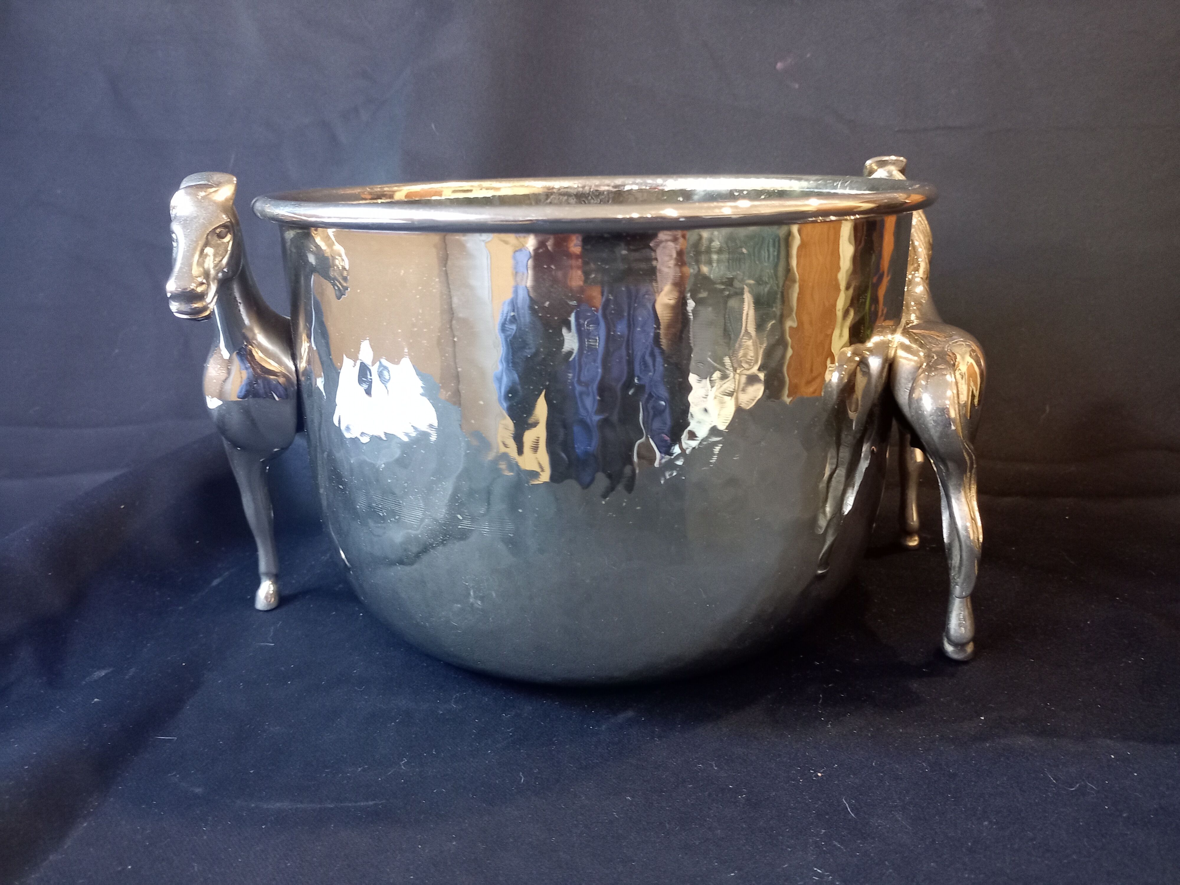 Bucket with decoration of horses