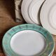 Six plates of vintage Badonviller earthenware with gold frieze