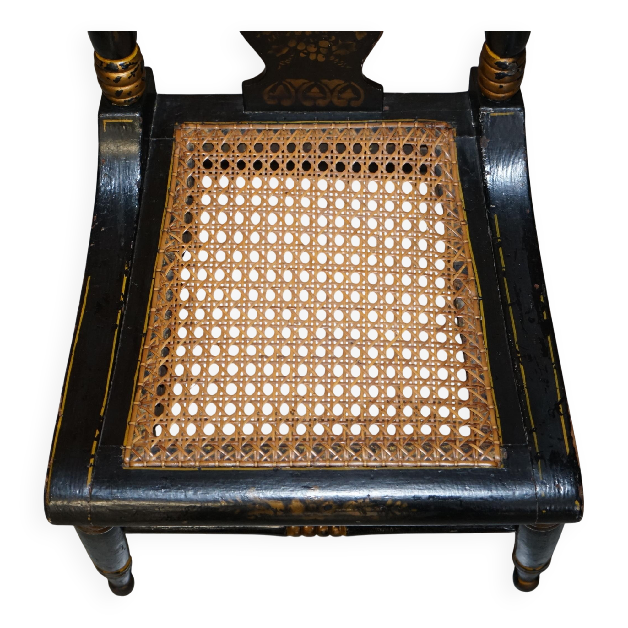 Georgian side bergère circa 1825, ebonised and hand-painted in Baltimore style.