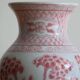 Chinese style flower vase with red and white flowers