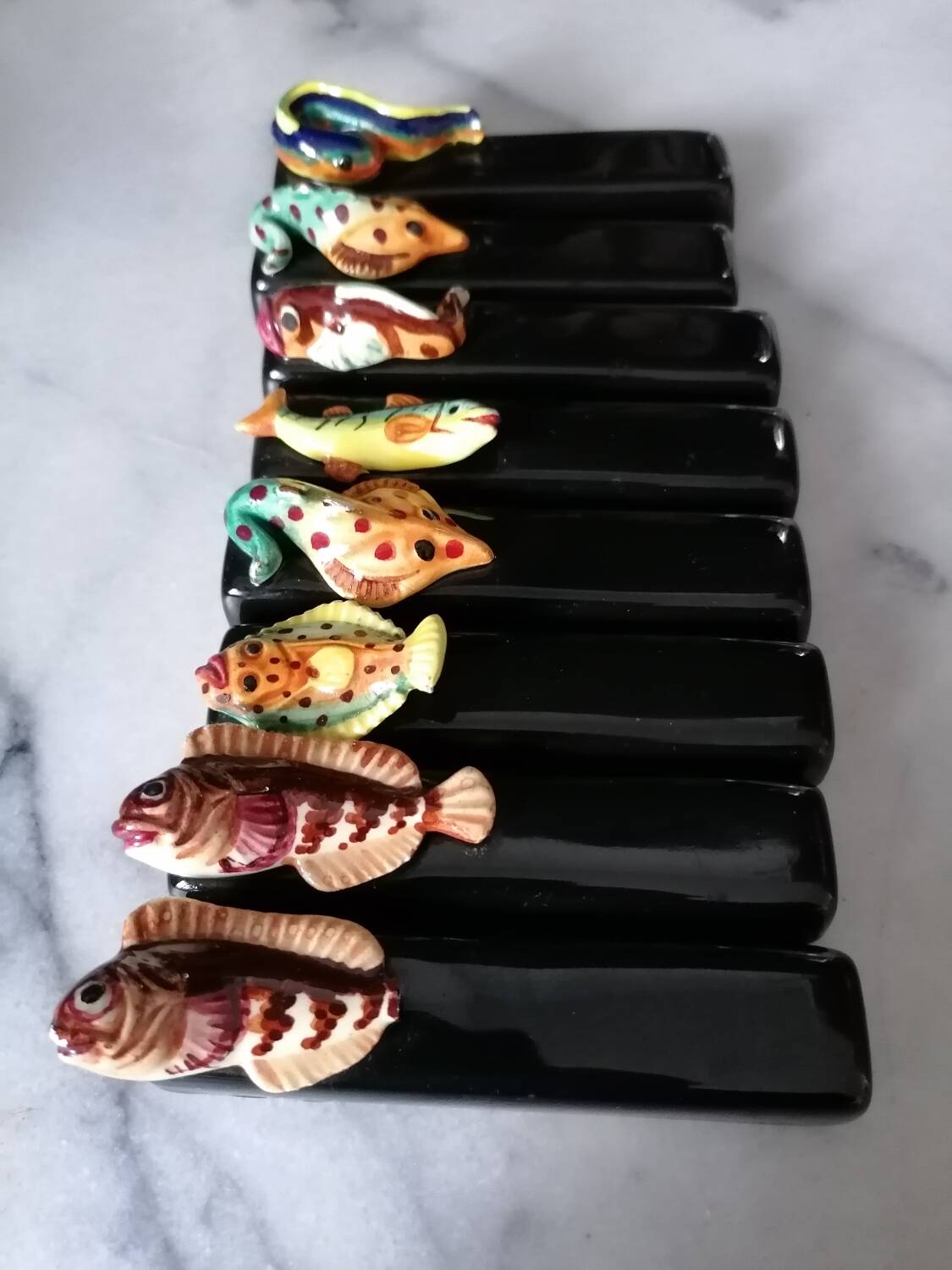 Vintage fish slip knife holders