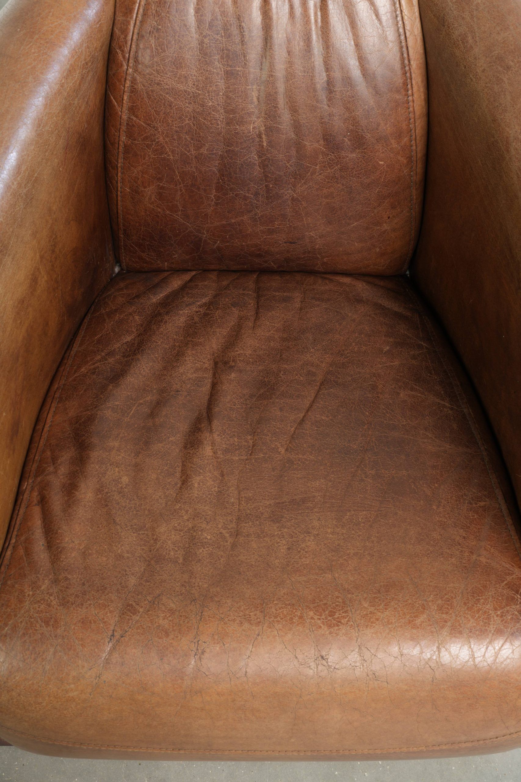 Fauteuil design aviateur en cuir de vache couleur cognac intemporelle