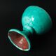 Cup on a pedestal or chalice in cloudy lagoon green glazed terracotta