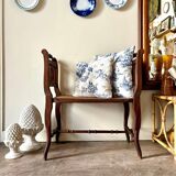 Dark wood and cane bench