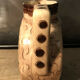 Ceramic pitcher with floral decoration signed Lucq
