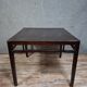 ancient Asian table, made of solid wood with a dark brown patina
