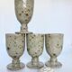 Four cups made of pyrity sandstone