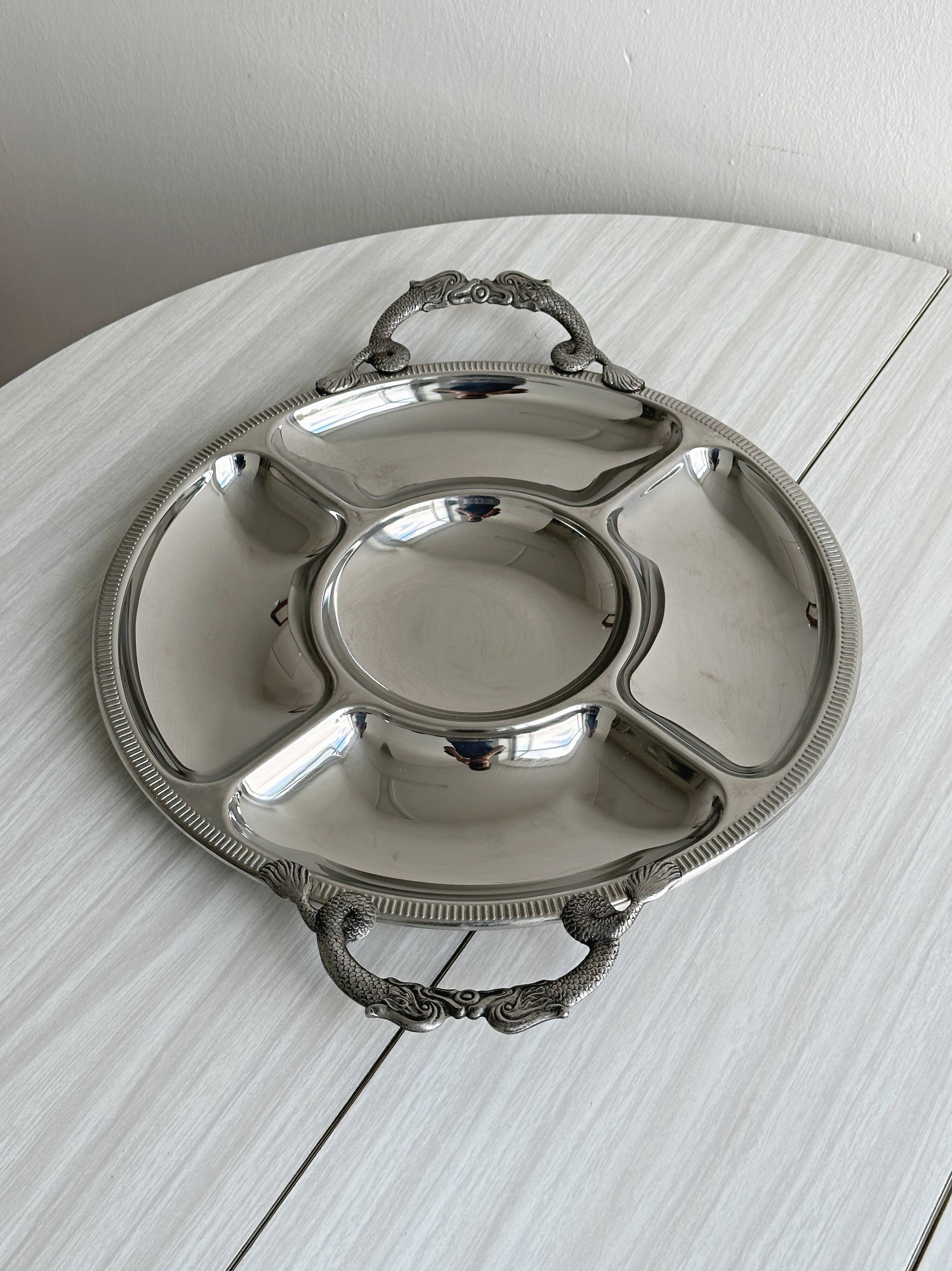 Vintage silver-plated metal serving tray with compartments.