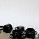 Batch of black cups