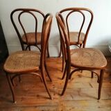 Series of 4 cane bistro chairs