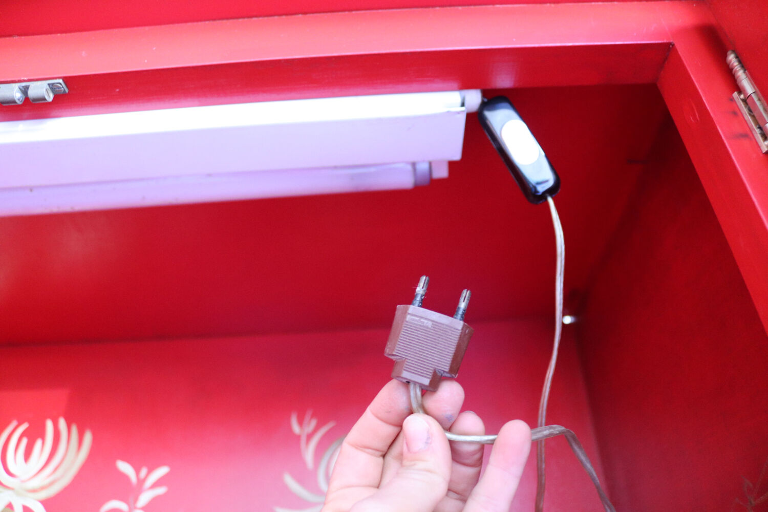 Black and red chinoiserie wardrobe – illuminated vintage furniture