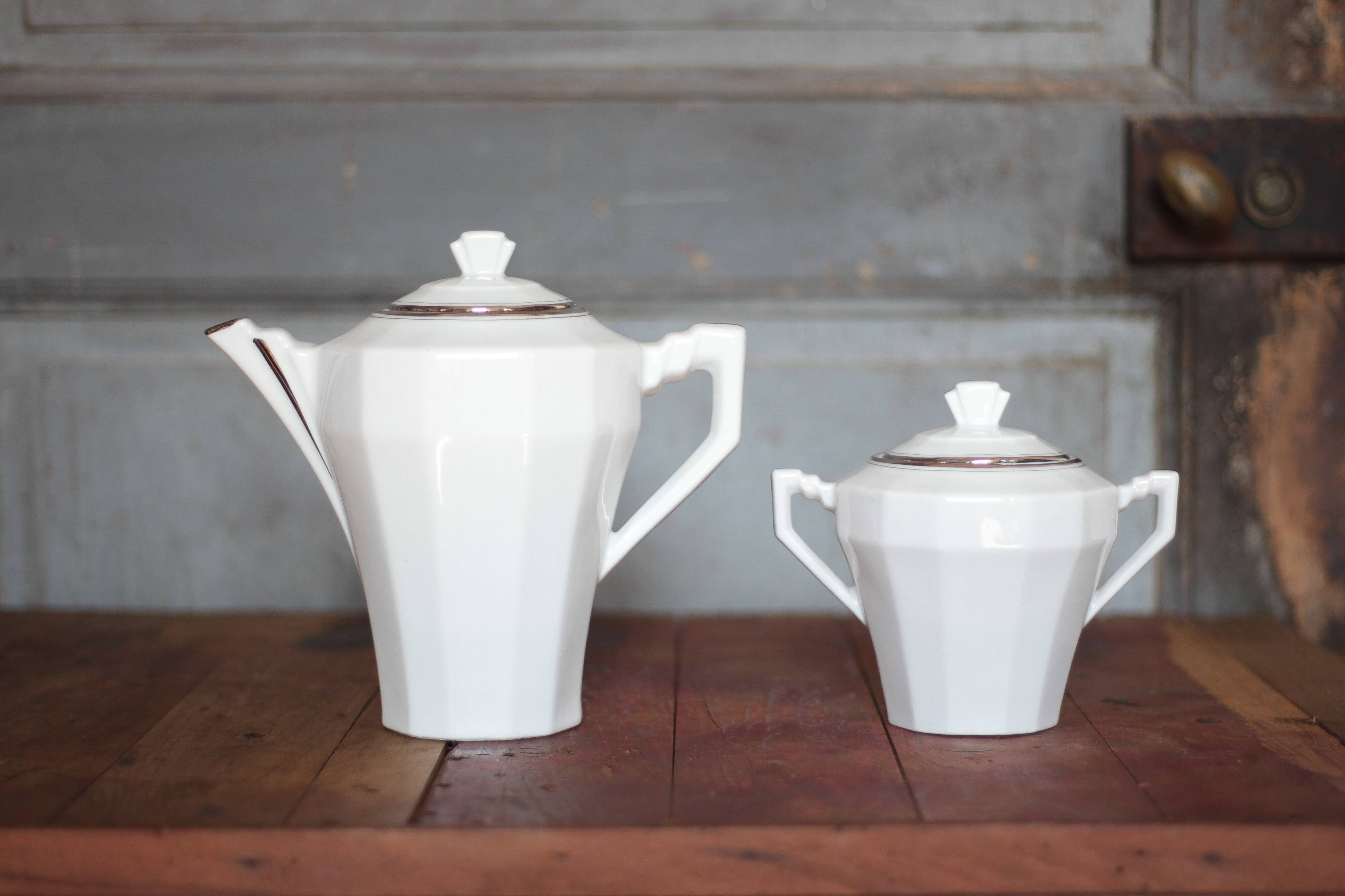 Art Deco porcelain teapot and its sugar bowl, porcelain coffee pot, kitchen.