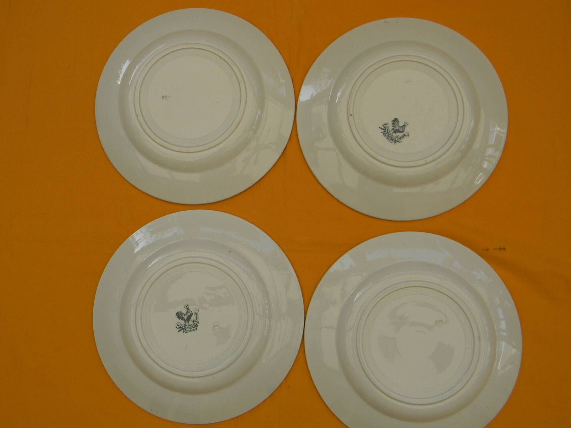 Set of 4 flat plates in saint amand earthenware. lily of the valley decor.