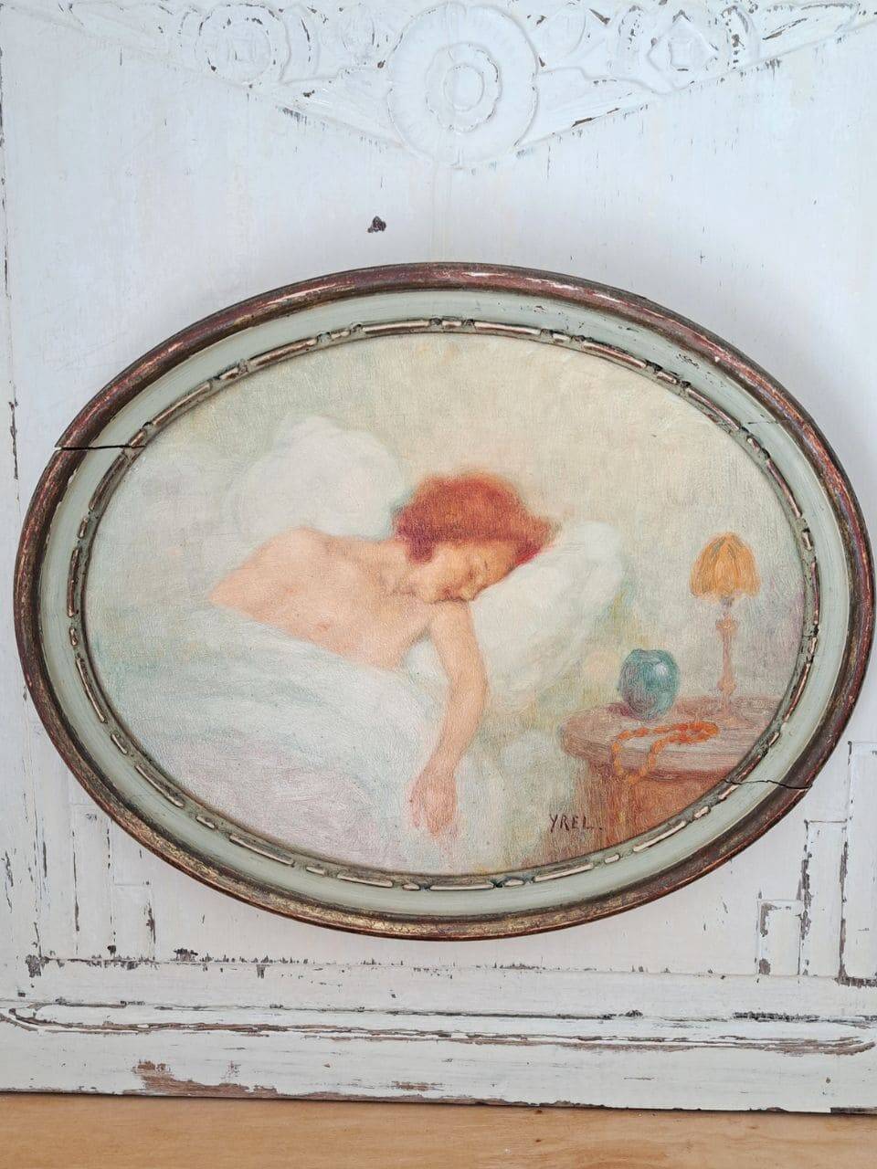 Ancient oval painting of a sleeping woman in oil on wood panel.