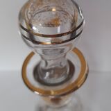 Antique golden carafe with colorful patterns