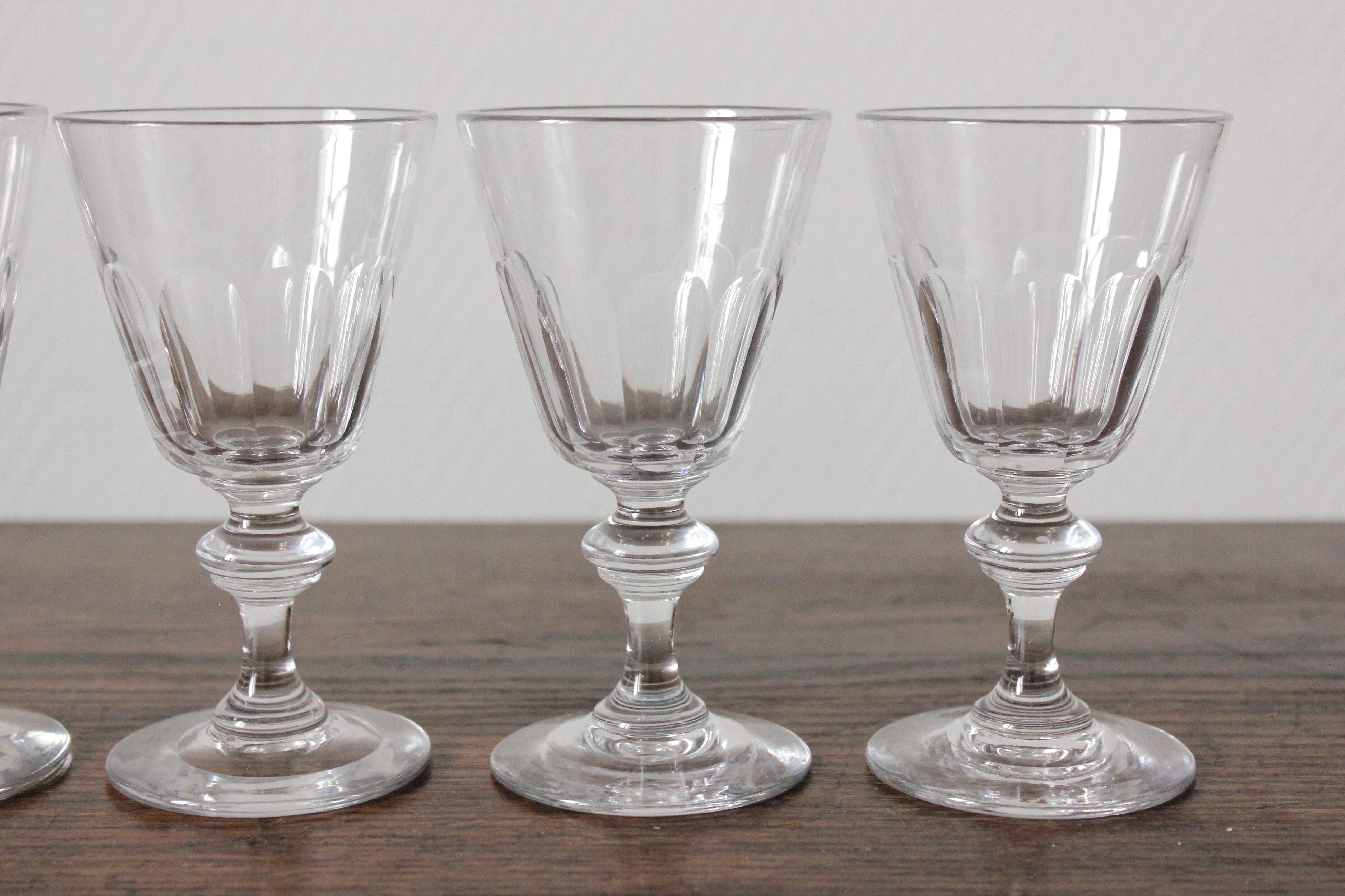 4 glasses with white wine in crystal ringing the nineteenth