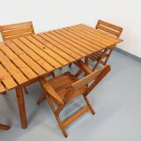 Vintage garden furniture set consisting of a table with extensions and 4 armchairs
