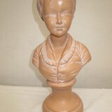 Old bust of a child in platre