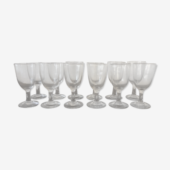 Suite of 12 blown-foot glasses, early 20th