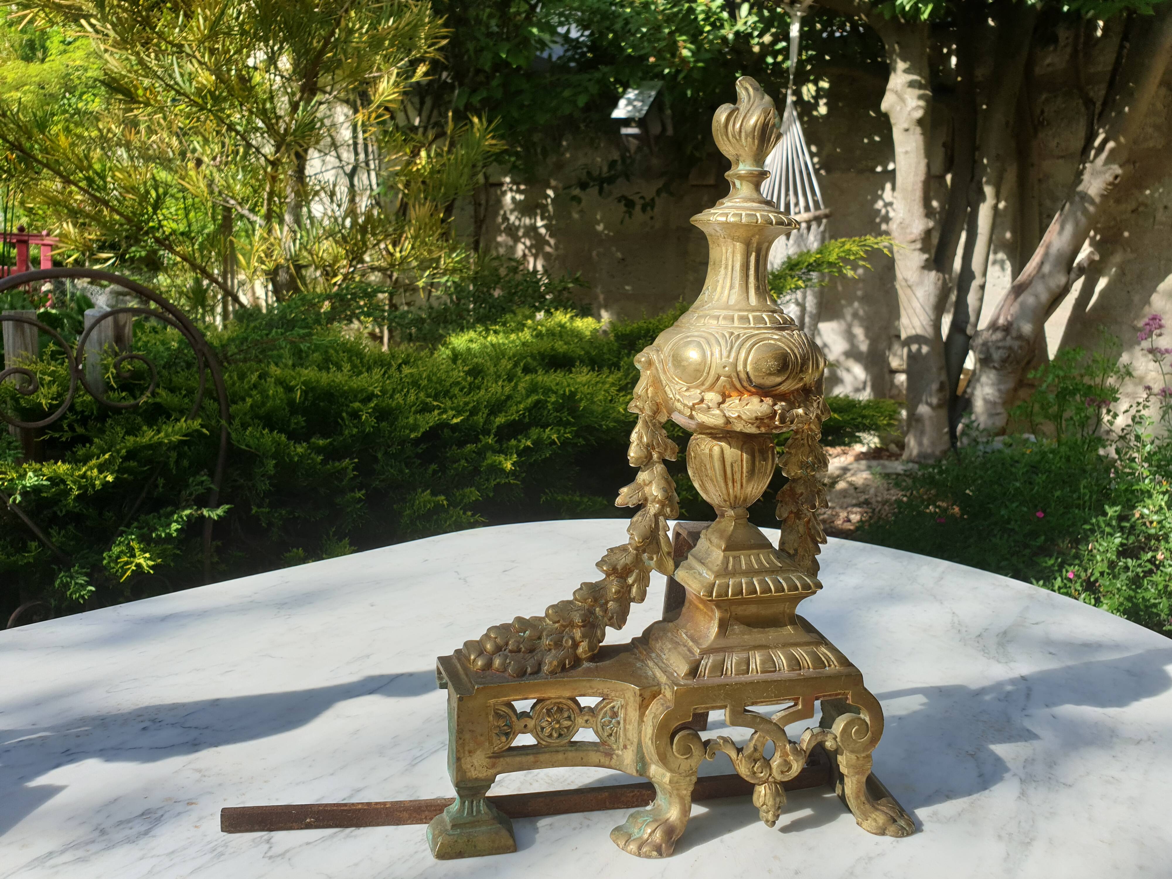 Chenêts and chimney bar in bronze nineteenth century.