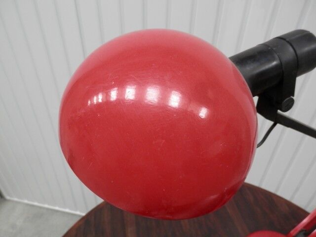 Red desk Guzzini lamp of the 1970s Italy