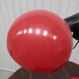 Red desk Guzzini lamp of the 1970s Italy