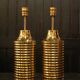 Pair of lamps in gilded brass